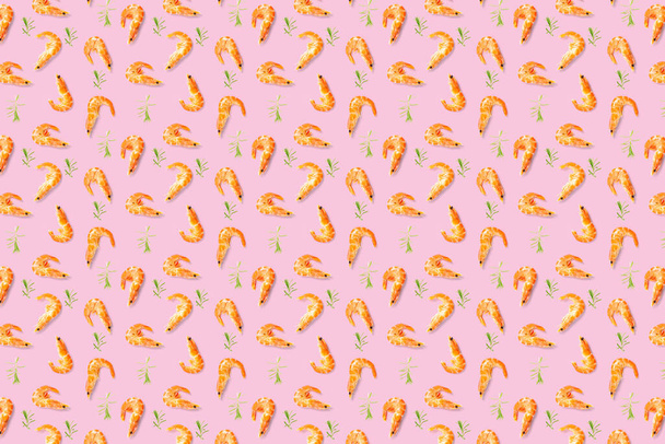 Tiger shrimp. Seafood background made from Prawns isolated on a pink backdrop. modern background from boiled shrimps, Seafood. not seamless pattern - Photo, Image