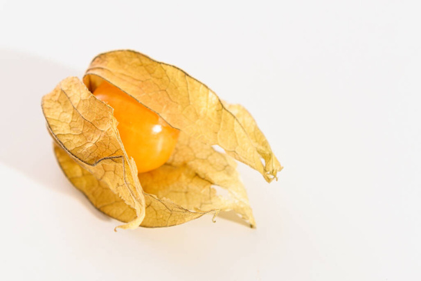 yellow physalis berry close up on white background - Foto, Imagen