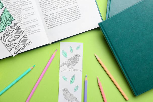Cute bookmarks with books and pencils on color background - Photo, Image