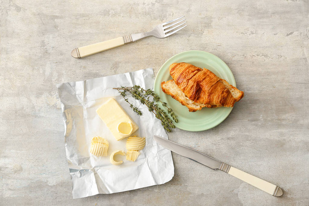 Composition with fresh butter and croissant on light  background - Foto, immagini