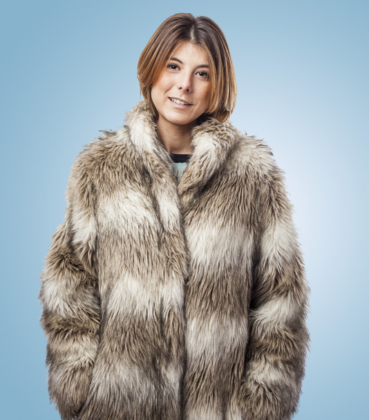 Woman wearing fur coat - Foto, Imagen