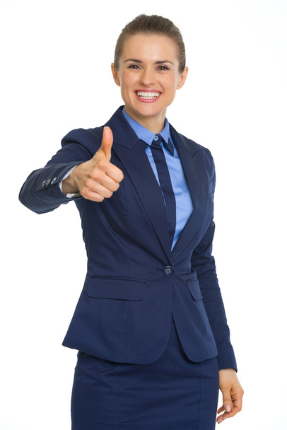 Businesswoman showing thumbs up - Фото, изображение