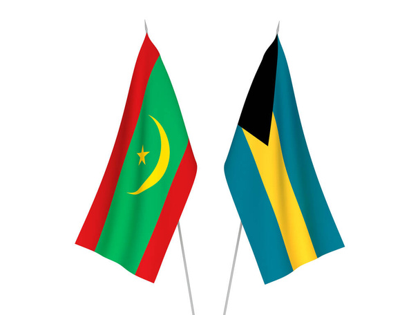 Εθνικές σημαίες υφάσματος της Κοινοπολιτείας των Μπαχαμών και της Ισλαμικής Δημοκρατίας της Μαυριτανίας που απομονώνονται σε λευκό φόντο. 3d απεικόνιση απόδοση. - Φωτογραφία, εικόνα