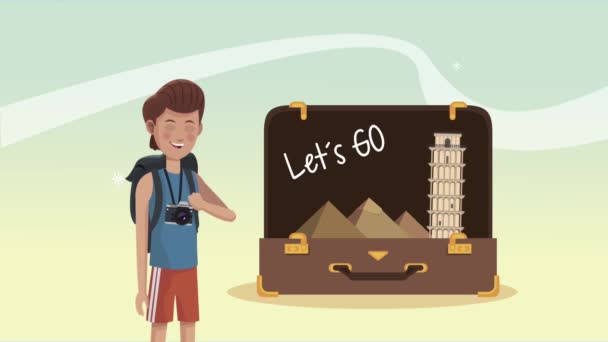 lets go travel lettering in suitcase and male tourist - Footage, Video