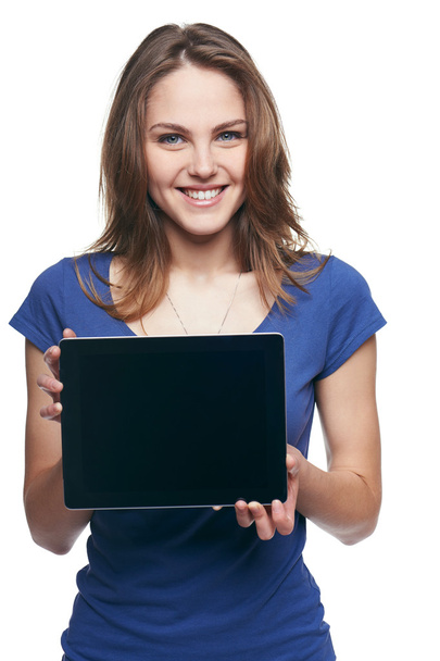 Woman showing tablet screen smiling - Фото, зображення