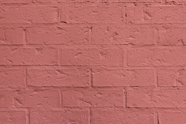 Primo piano di verniciato arancio mattone parete texture sfondo. - Foto, immagini