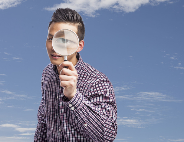 Man with magnifying glass - Photo, Image