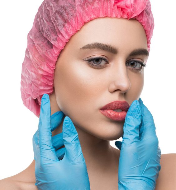 Girl in a pink cap and gloves isolated shot - Foto, Imagem