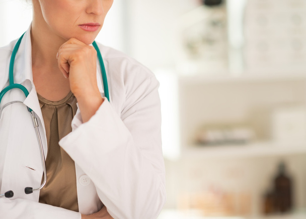 Thoughtful medical doctor woman in office - Foto, Imagem