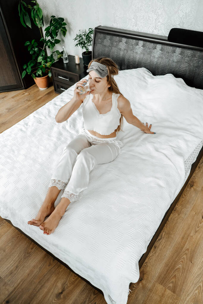 Self care, Mental health, mental wellbeing, calm, mourning routines, start day. No stress, healthy habit, concept. Young woman in pajamas doing morning routines. - Photo, Image