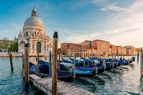 Gondolas and Santa Maria della Salute famous church, Venice, Italy - Photo, Image