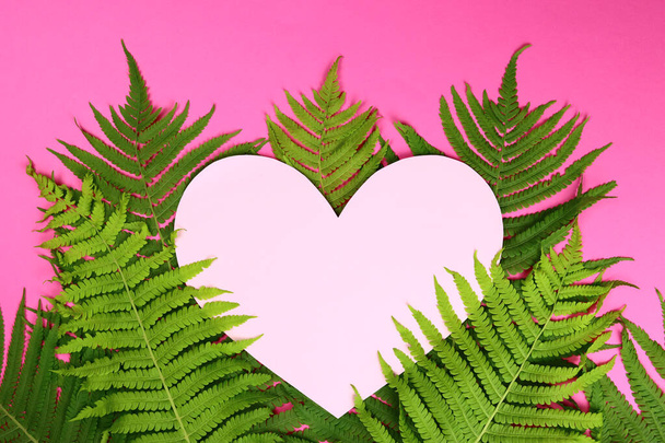 Empty space heart on the background of green leaves. Tropic love summer mock-up. - Photo, image