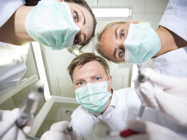 Dentista y enfermeras
 - Foto, Imagen