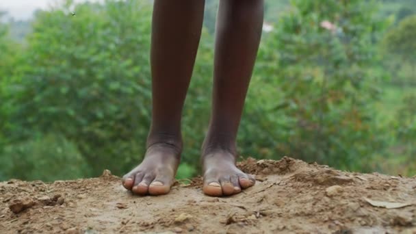Close up of barefoot legs - Filmati, video