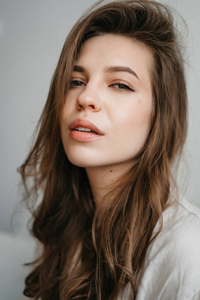 Close-Up Portrait Of Beautiful Young Woman With Healthy Clean Skin On A Face - Foto, immagini