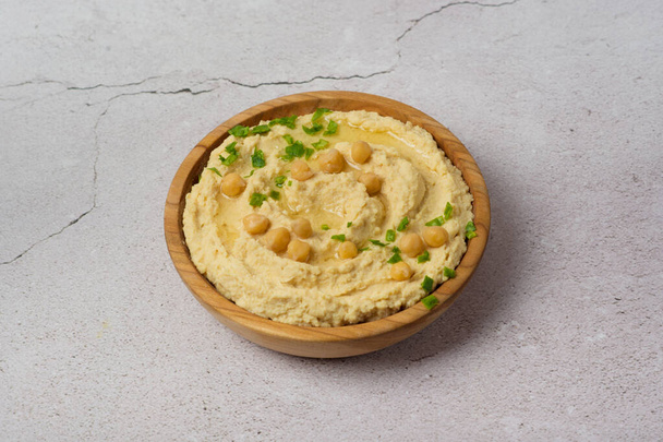 Hummus dip levy kevyellä taustalla - Valokuva, kuva