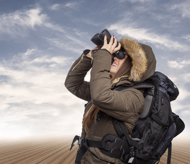 Woman with binoculars - Фото, изображение