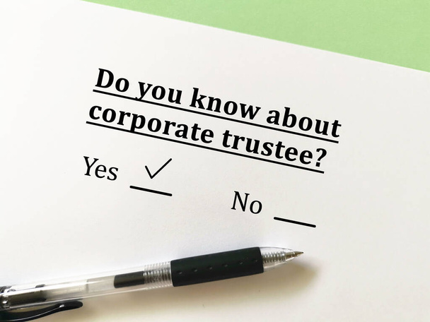 One person is answering question about last will. He knows about corporate trustee - Photo, Image