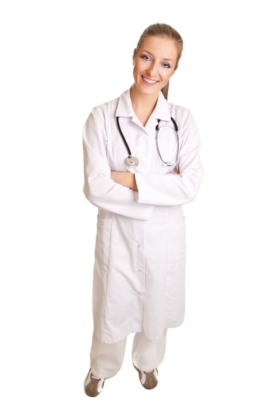 Женщина-врач в форме со стетоскопом изолирована на белом
 - Фото, изображение