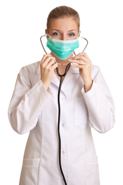 Medical doctor woman in uniform with stethoscope isolated on white - Valokuva, kuva