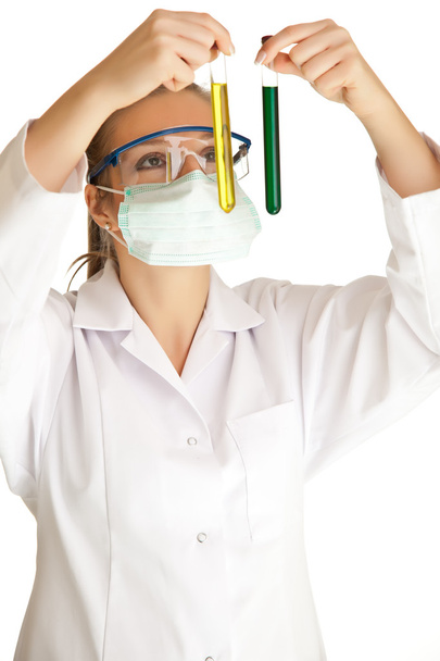 Isolated scientist woman in lab coat with chemical glassware - Фото, зображення