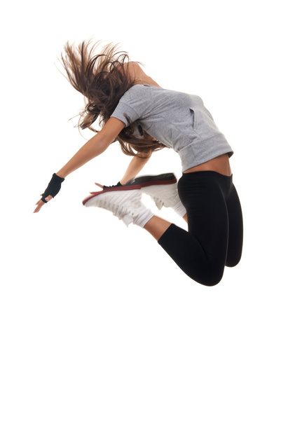 moderne stijl danser springen op geïsoleerde achtergrond - Foto, afbeelding