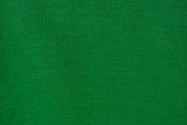 A closeup shot of green fabric matting used for wallpaper or background - Fotografie, Obrázek