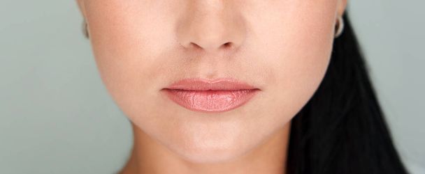 Beautiful lips Close-up. Makeup. Lip matte lipstick. Sexy lips. Part of face, young woman close up - Foto, Imagem