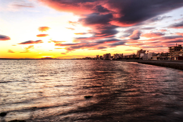 Colorful and Beautiful sky and sea at Sunset in Santa Pola, a small fishing village in southern Spain - Foto, imagen