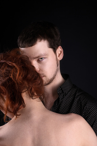 Man and red woman - closeup lovers portrait - Fotó, kép