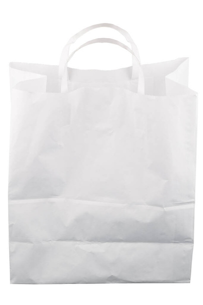 used white paper bag with handles isolated on white background - Photo, Image
