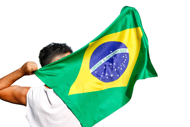 Hombre con bandera de Brasil aislada sobre fondo blanco. Espacio para texto. - Foto, imagen