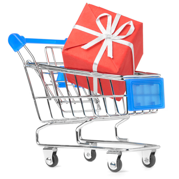 Closeup of a shopping cart with gift - 写真・画像