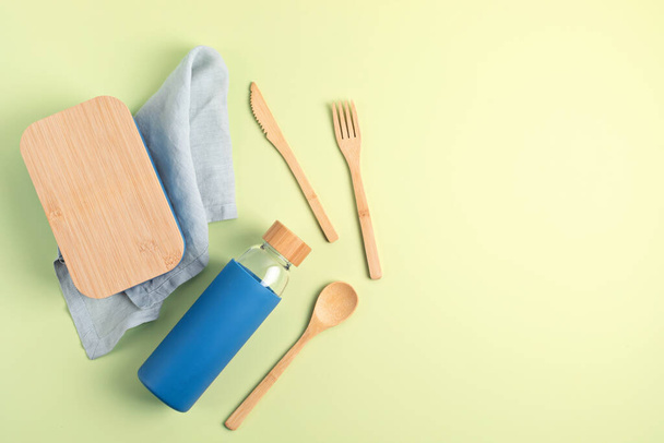Zero waste kit for lunch, reusable bottle, box and bamboo cutlery - Photo, Image