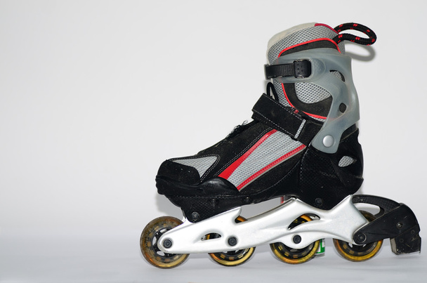 rollerskates for men in gray and red on a white - Zdjęcie, obraz