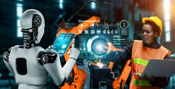 Механізований промисловий робот і працівник, який працює разом на майбутньому заводі
 - Фото, зображення