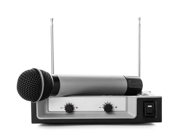 Modern microphone with audio system on white background - Photo, Image
