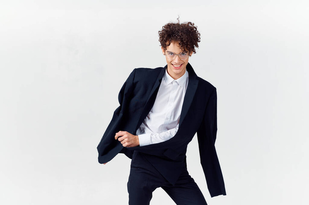 business man curly hair black jacket emotions Studio - Foto, Imagen