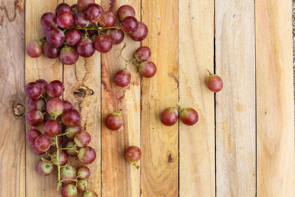 grapes fruit on wood background - Photo, Image