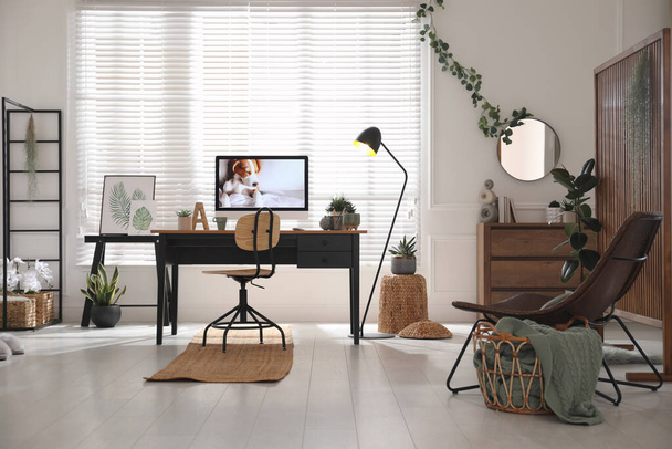 Stylish home office interior with comfortable workplace - Photo, image