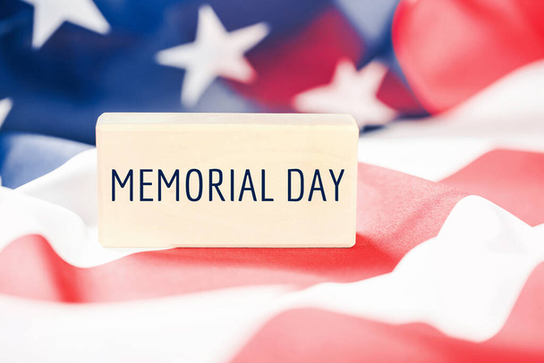 Memorial Day text over American flag banner. US rememberance Day background - Foto, imagen