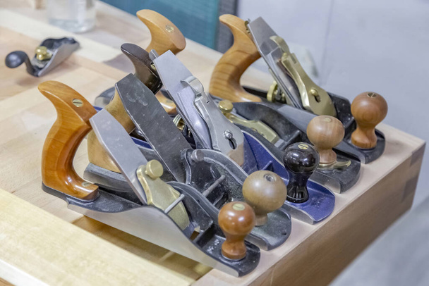 Mechanical working tool in a carpentry workshop. Manual production of wood and precious woods products - Photo, Image