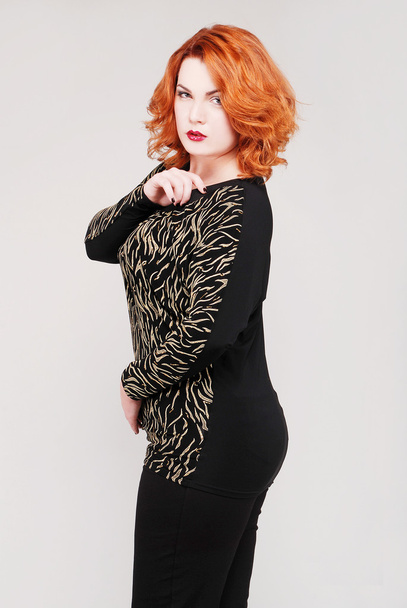 Attractive young redhead woman in stylish clothes - Fotografie, Obrázek