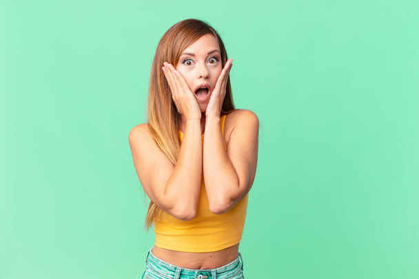 pretty adult woman feeling shocked and scared - Photo, Image