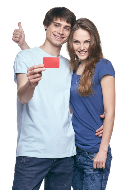 Happy couple with credit card - 写真・画像