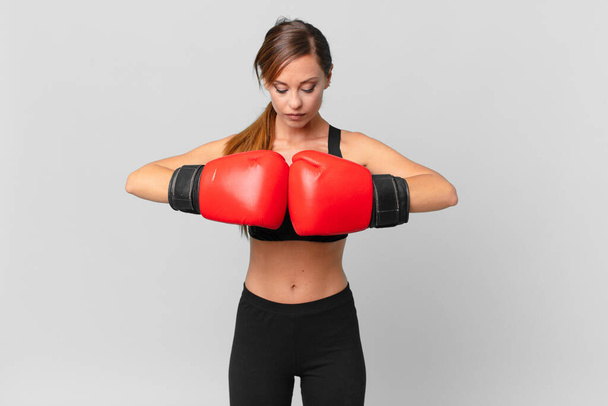 young pretty woman fitness and boxing concept - Valokuva, kuva