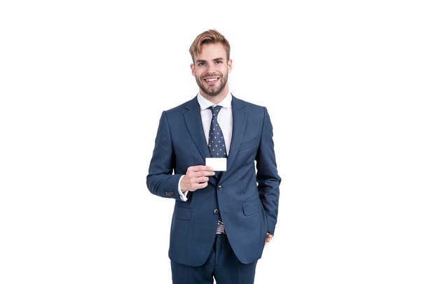 businessman demonstrating credit or debit card. empty plastic business name card. - Фото, зображення