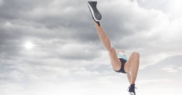 Composition of caucasian female high jumper in the air with copy space. sport and competition concept digitally generated image. - Фото, зображення