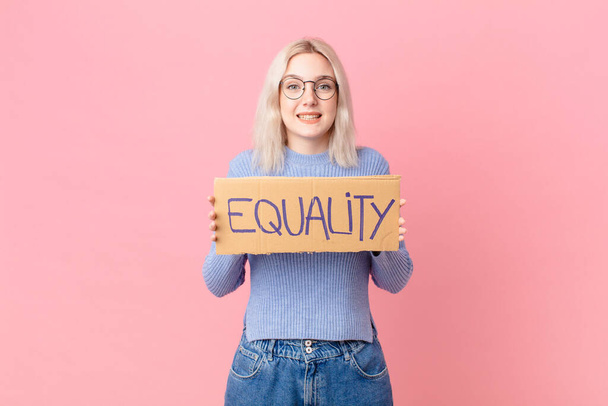 blond woman with a equality concept banner - Φωτογραφία, εικόνα