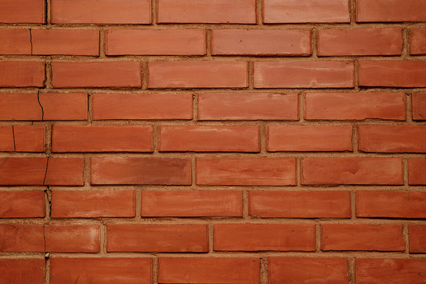 Texture de fond murale en brique orange. Peut être utilisé comme arrière-plan pour toute publicité. - Photo, image